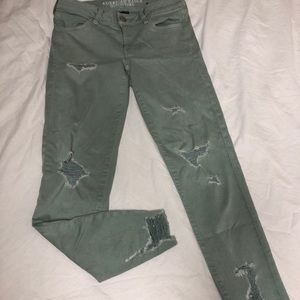 green distressed jeans